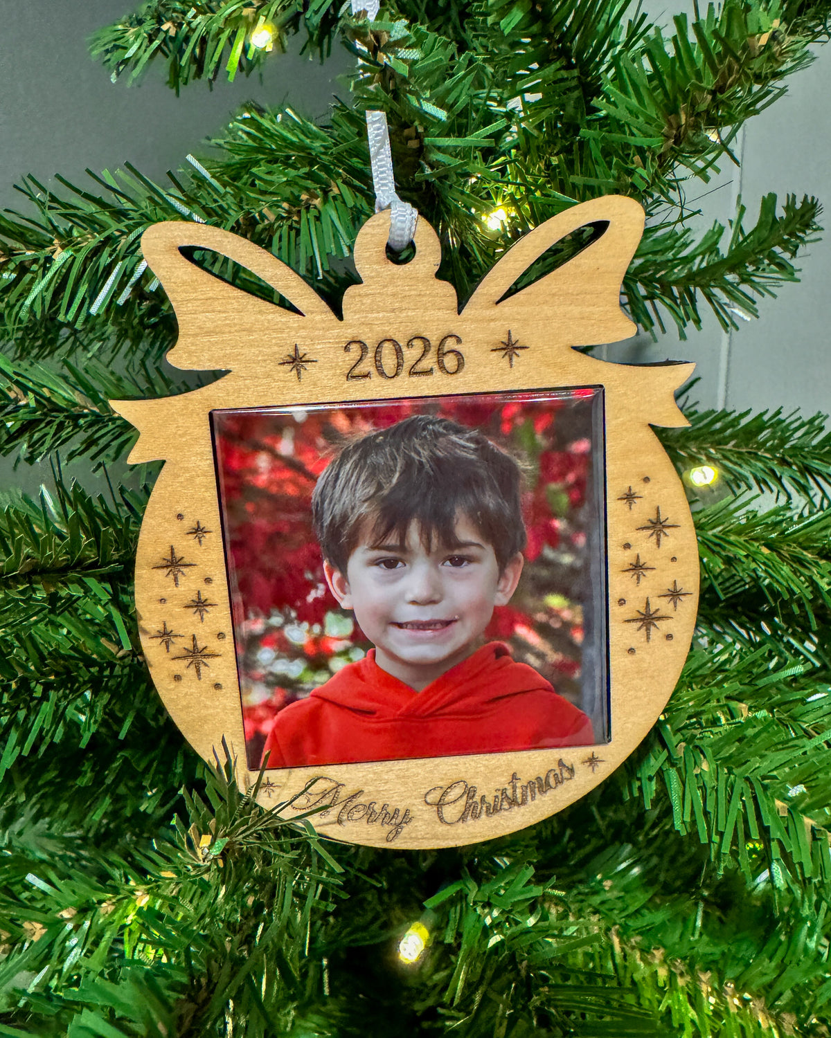 2026 natural wood Merry Christmas photo magnet ornament hanging on a Christmas tree