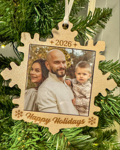 2026 snowflake photo magnet ornament hanging on a Christmas tree
