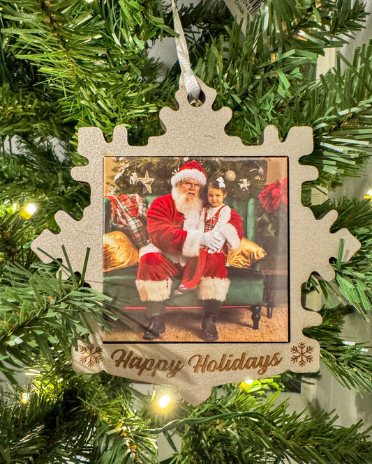 Custom silver snowflake photo magnet ornament with Santa photo hanging on a Christmas tree