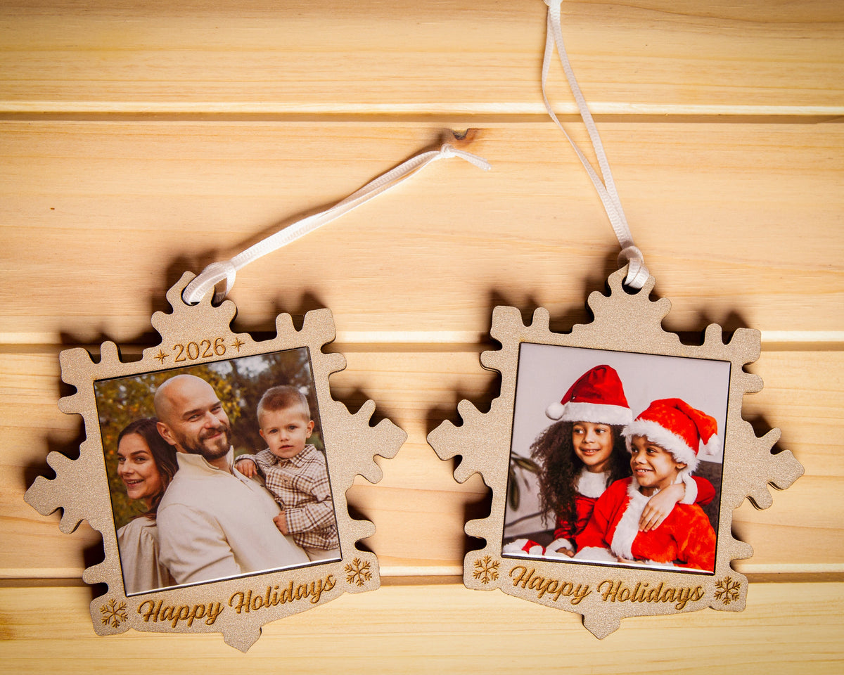 Dated and non-dated silver snowflake photo magnet ornaments displayed side by side