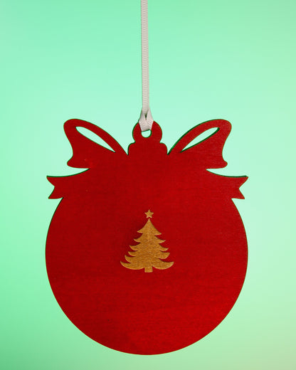 Back of red Merry Christmas photo magnet ornament showing removable magnet hardware